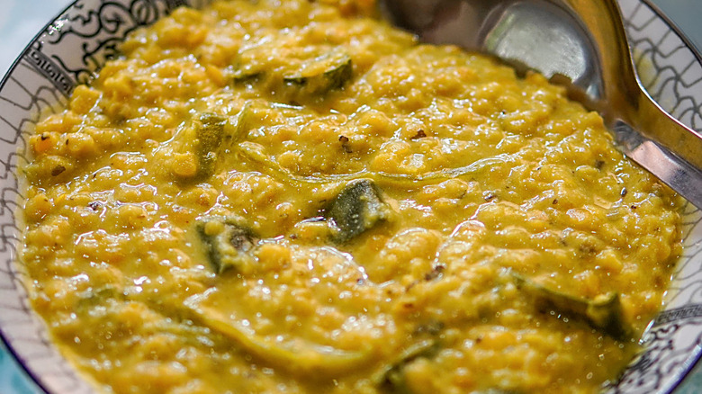 Close-up of dal in a bowl with spoon