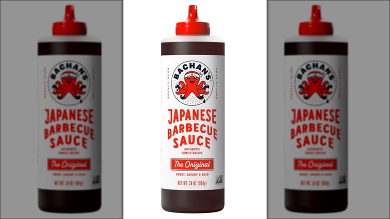 Bottle of Japanese barbecue sauce against white background.