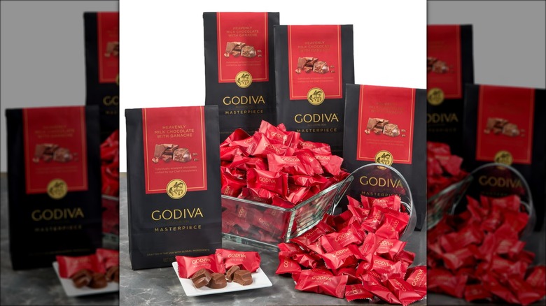 Multi-box gift set of Godiva chocolates against white background.