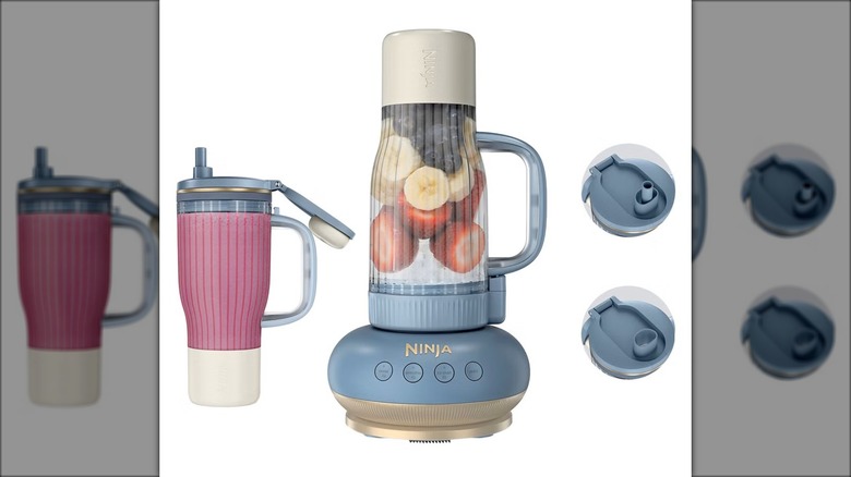 Blender set with drinking tumbler and lids.