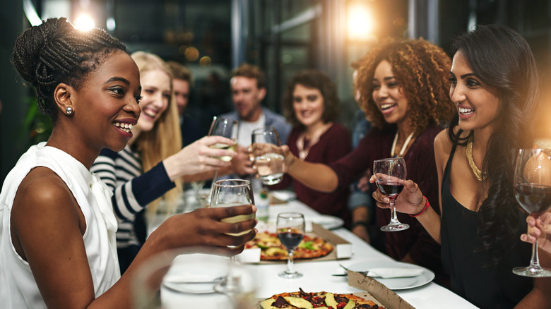 Group of friends having dinner at a restaurant