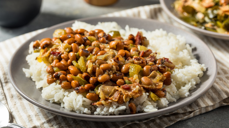 a plate of Hoppin' John on a nicely set table