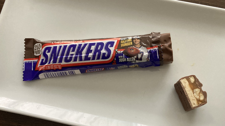 Snickers on plate with filling showing