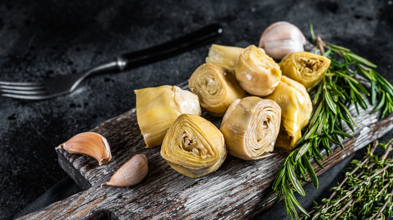 artichoke hearts on cutting board