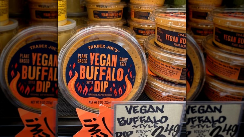 Container of Trader Joe's vegan buffalo dip on the store shelf