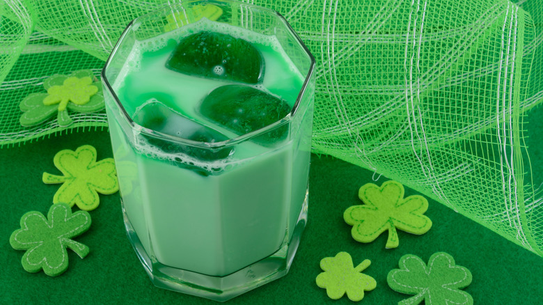 Green cocktail with paper shamrocks