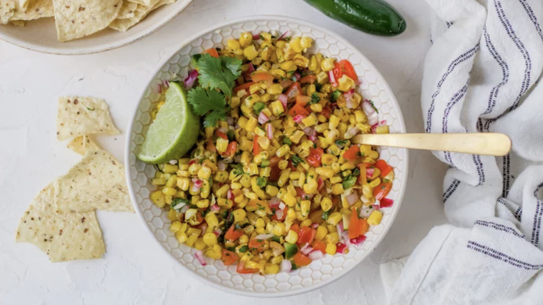 Bowl of Roasted Corn Salsa and corn chips