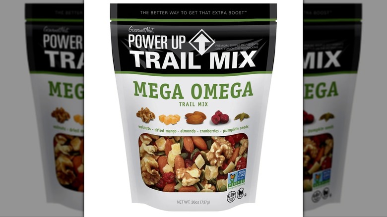 Bag of Gourmet Nut trail mix with nuts, dried fruits, and seeds.