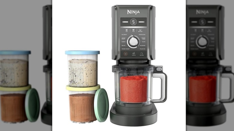 Ninja Creami ice cream and frozen dessert maker with various cups of treats.