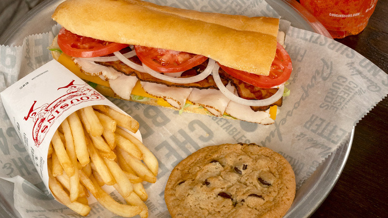 sub sandwich, drink, and cookie from cousins subs