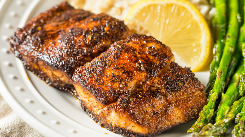 Homemade blackened mahi mahi white fish with rice