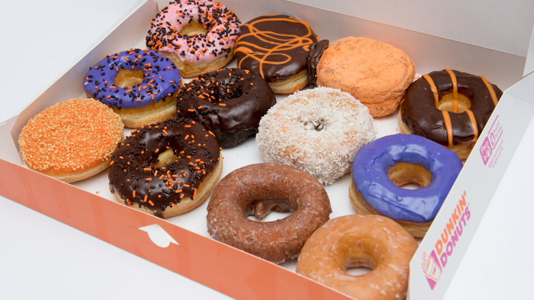 An assortment of Dunkin' donuts in a box