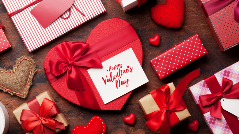 Valentine's Day treats and gifts in red boxes with bows