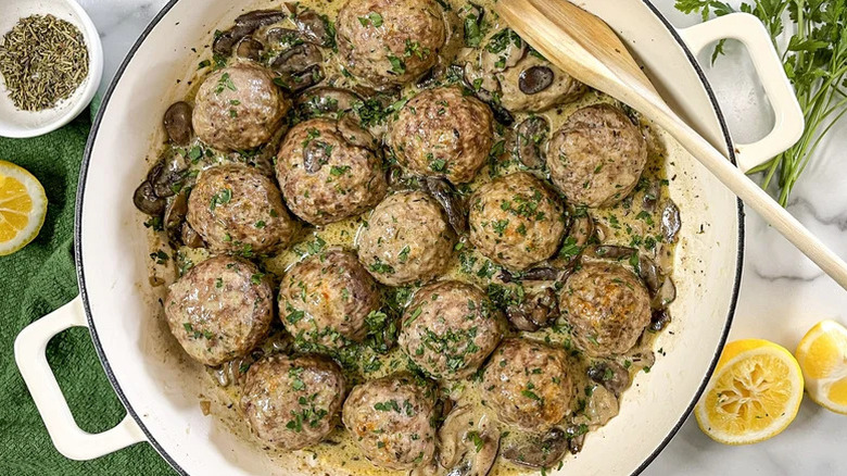 pot of meatballs with cream sauce