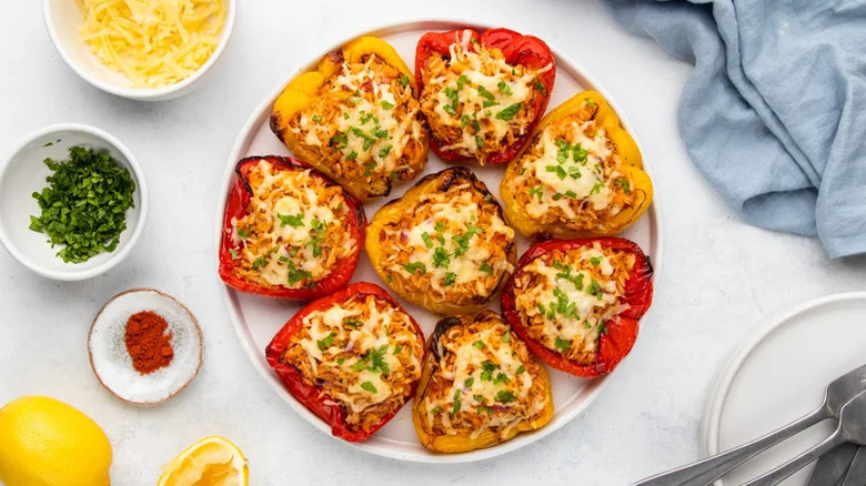 platter of seafood stuffed bell peppers