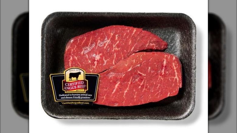 Pack with top sirloin strip steak.