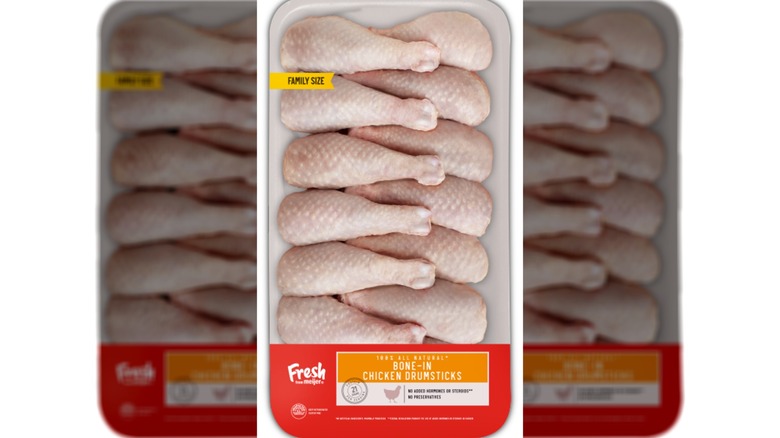 Pack of raw bone-in chicken drumsticks.