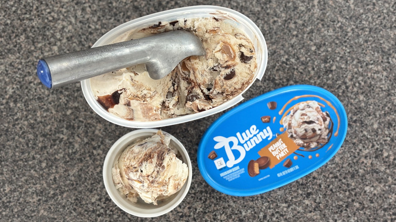 top view of ice cream container with peanut butter and fudge swirls