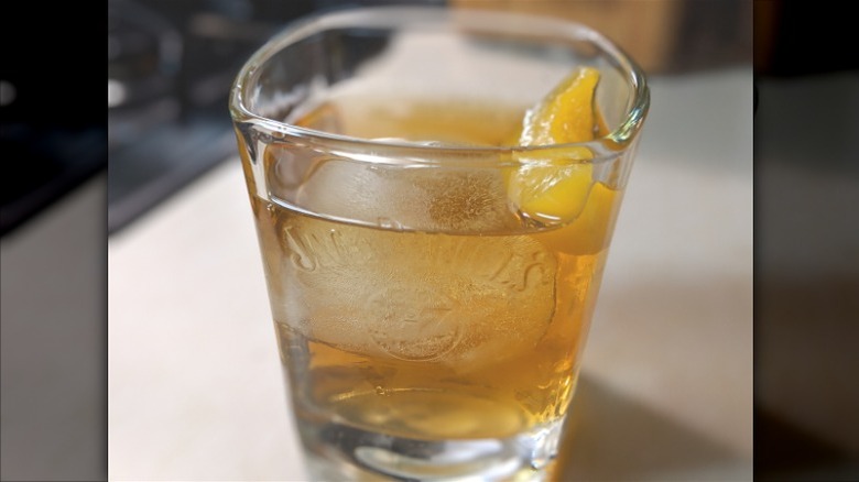 Kentucky Colonel cocktail with a lemon twist