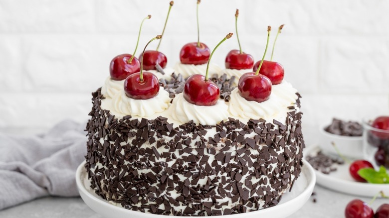 Cake with chocolate pieces and cherries