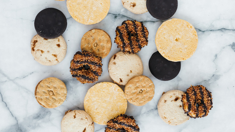 Assorted Girl Scout Cookies on marble background