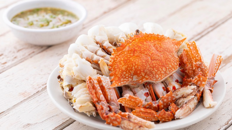 cooked crab with dipping sauce