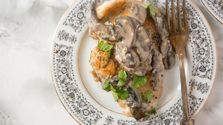 plate of chicken marsala with mushrooms