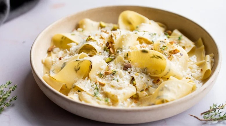 bowl of freshly made pasta in a bowl with Parmesan
