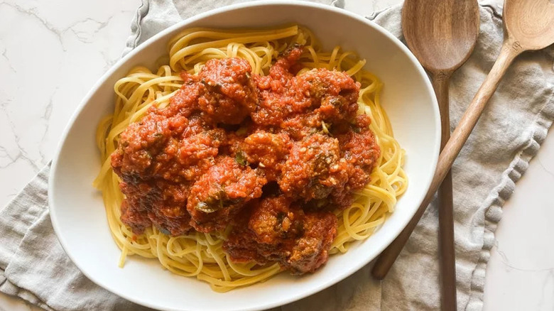 Homemade meatballs over spaghetti