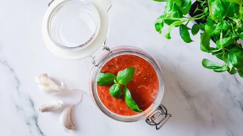jar of sugo with basil
