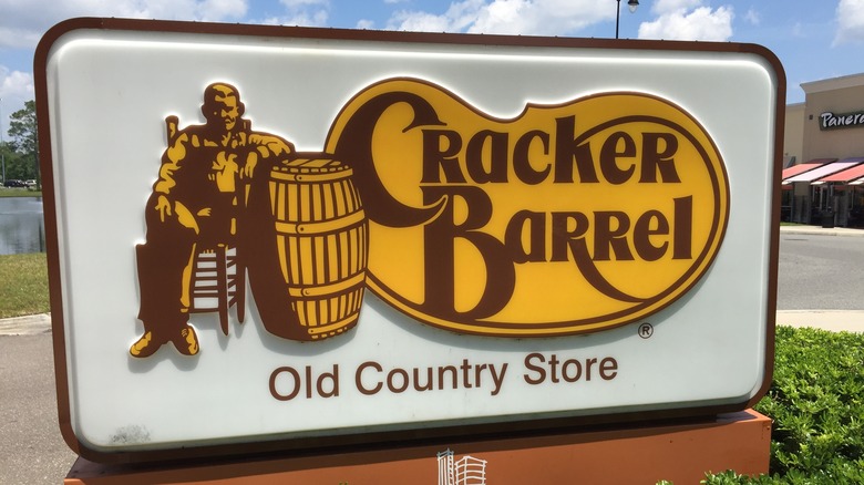 Cracker Barrel sign and greenery