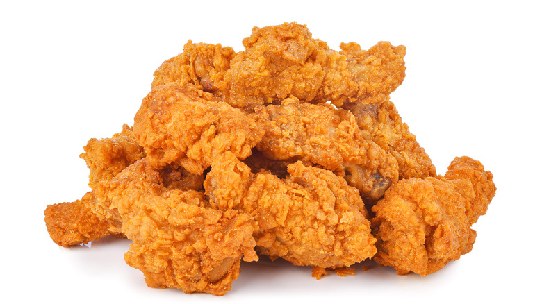 Pile of fried chicken pieces