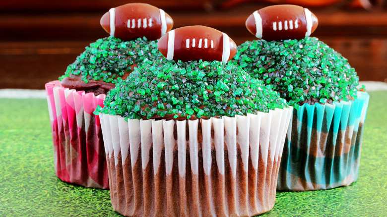 chocolate cupcakes with football decorations