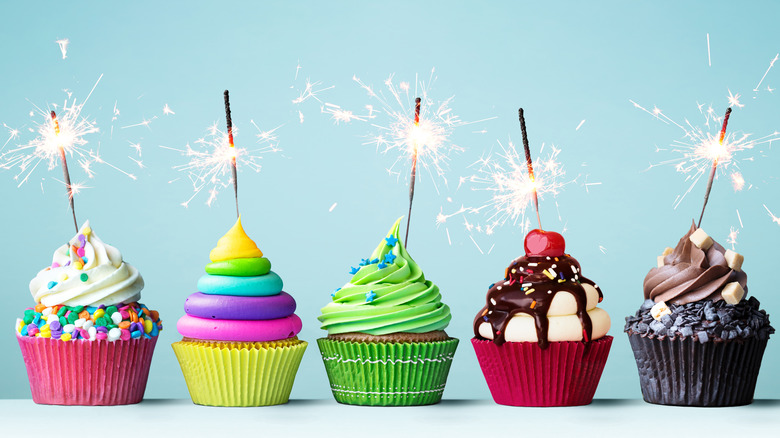 Row of cupcakes with sparklers 