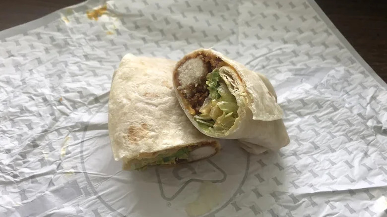 Sonic Crispy Tender wrap cut in half on paper