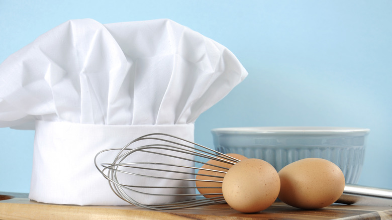 Chefs hat, rolling pin, and eggs 