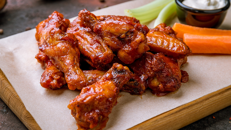 Buffalo chicken wings on a serving board