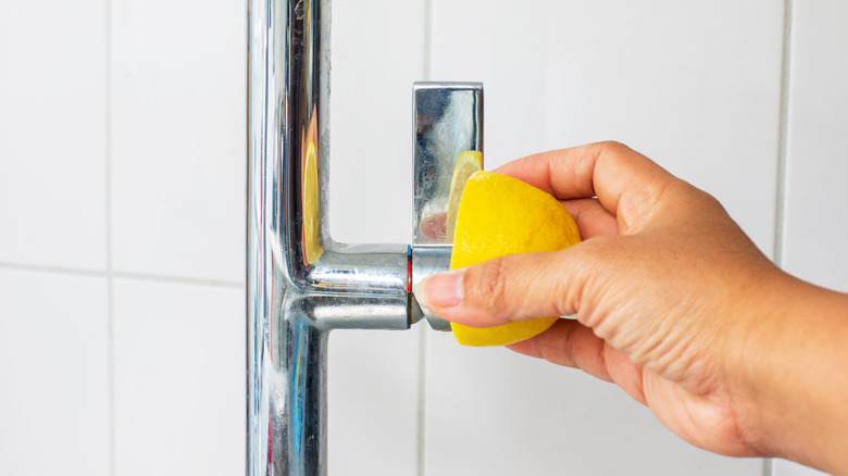 faucet with lemon to clean