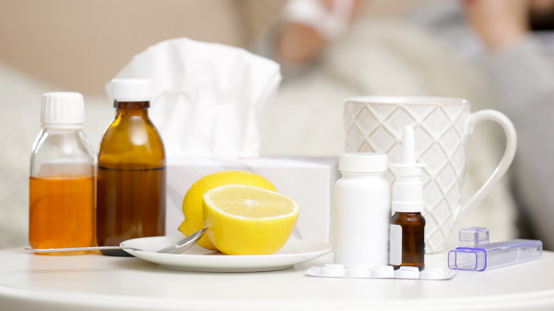 lemon tea with tissues and medicine