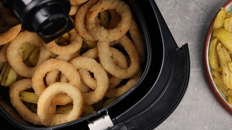 Calamari inside an air fryer basket