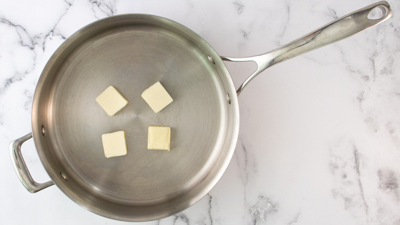 butter melting in pan