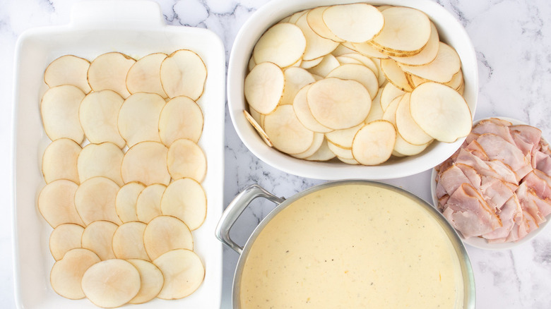 white pan with potatoes