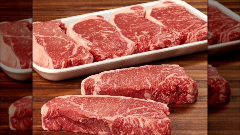 Package of New York strip steaks.