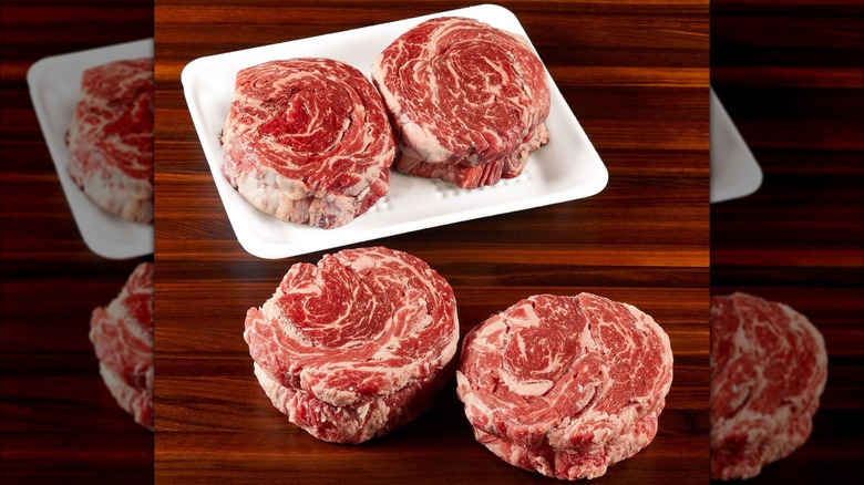 Package of ribeye steaks with cap.
