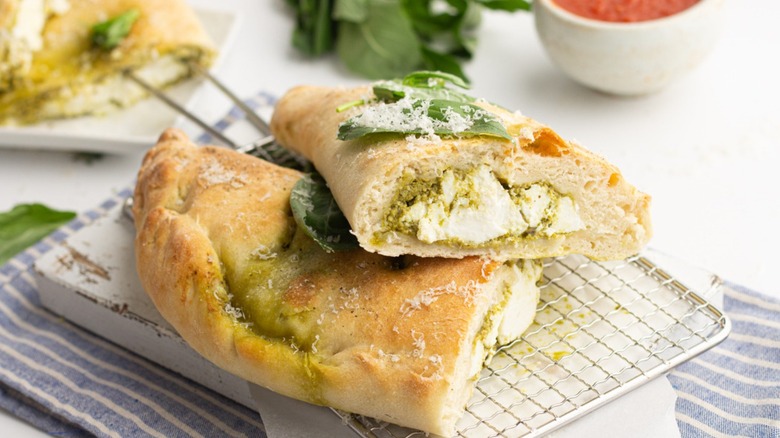 pesto calzone, cut in half