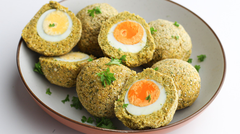 Falafel scotch eggs on plate