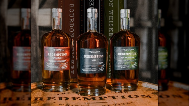 Three varieties of Redemption whiskeys with the rye whiskey in the center.