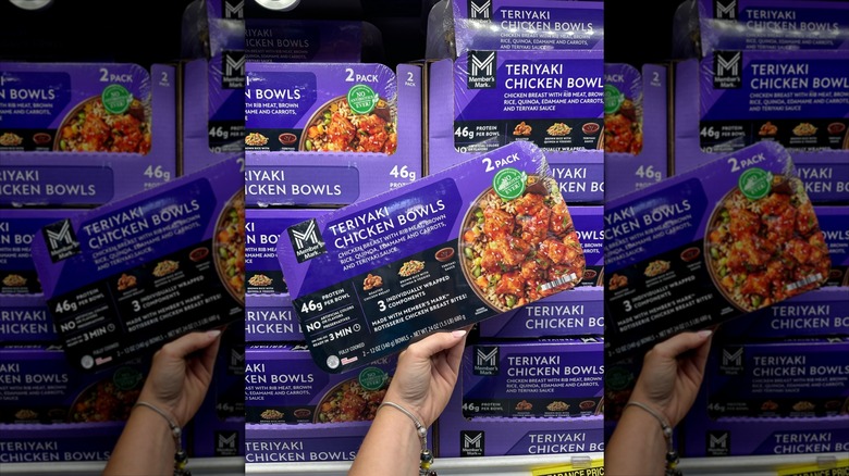 person holding member's mark package at Sam's Club