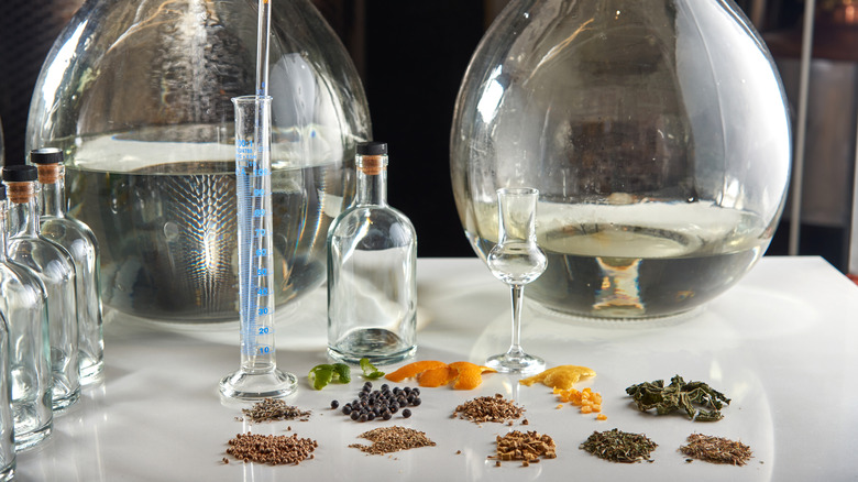 Gin ingredients with lab equipment