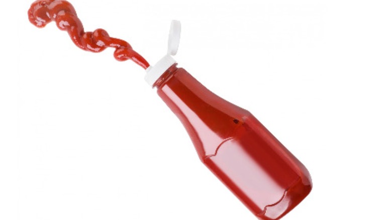 Unlabeled ketchup bottle squirting